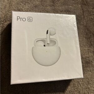 Pro 6 Wireless Earbuds with charging case . These are pink . New in the box